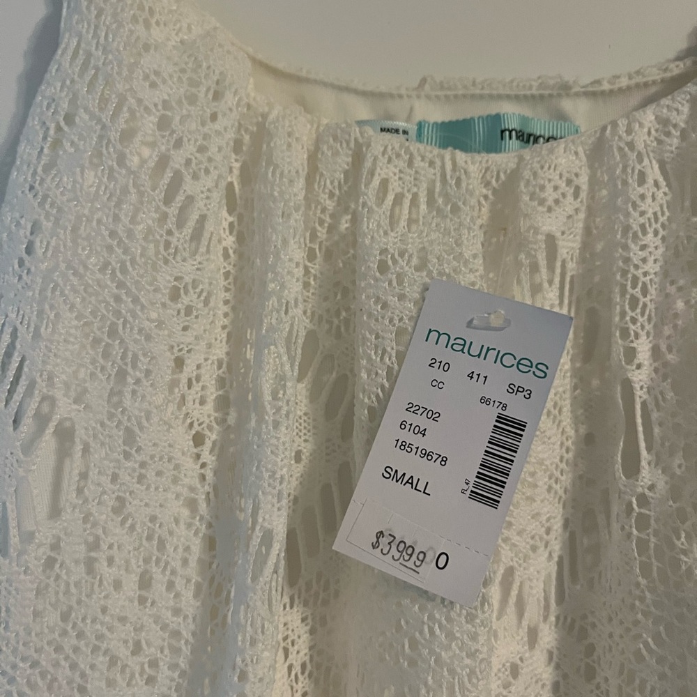 Maurice’s white knit maxi dress with slip underneath.